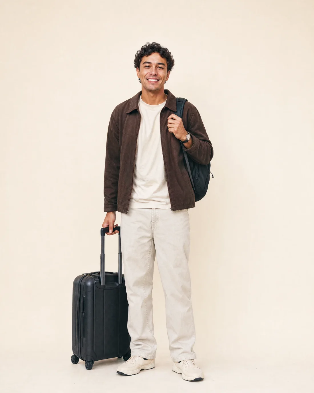 Voyageur arrivant avec sa valise